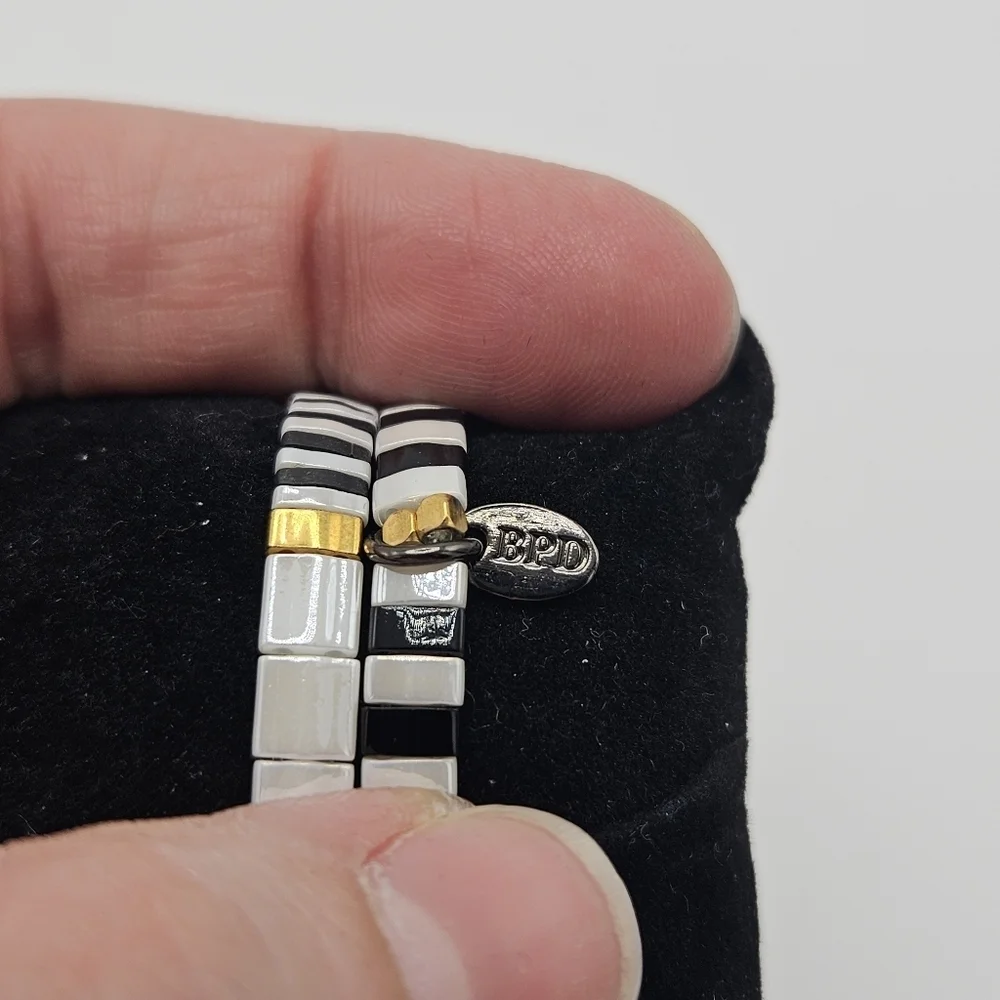 BPD pair of Pixie stretch bracelets black white gold